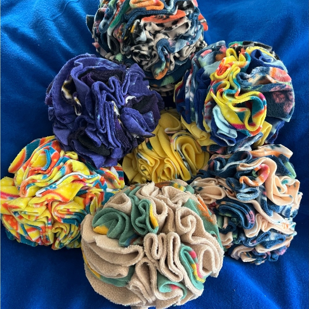 Snuffle ball interactive dog toy.